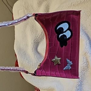 Pink Eye Emoji with a star and butterfly.